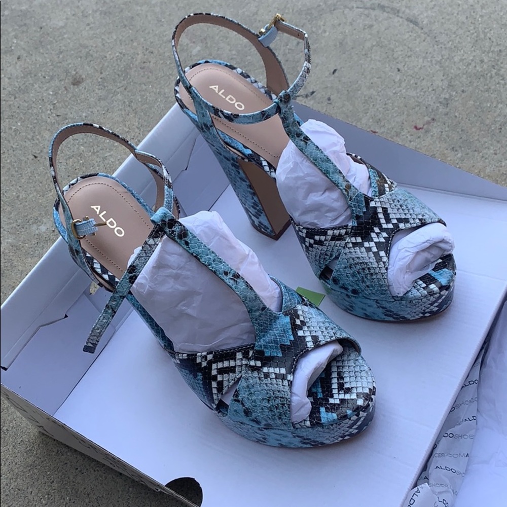 Blue snake skin platform heels.